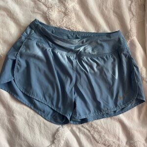 Blue Nike athletic shorts